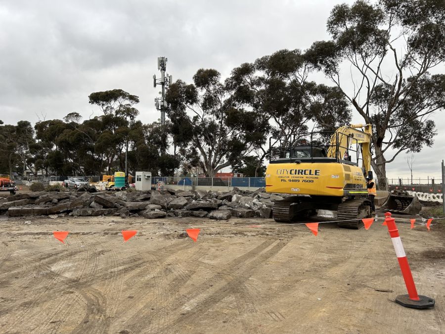 Image shows a digger on a construction site in Diggers Rest. 