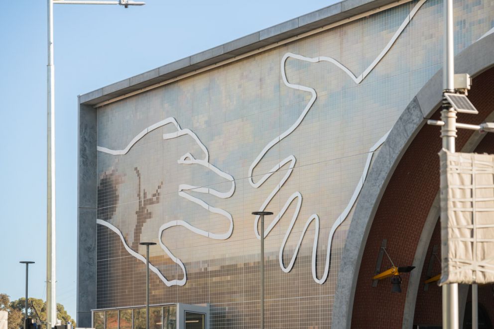 A close up of the mosaic hands in Abdul Abdullah 'Come Together' artwork. 