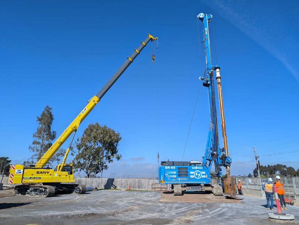 Crane and piling rig on the eastern side of the Old Calder Highway works site