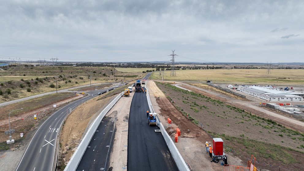 Asphalting works on the new road bridge under construction at Calder Park Drive