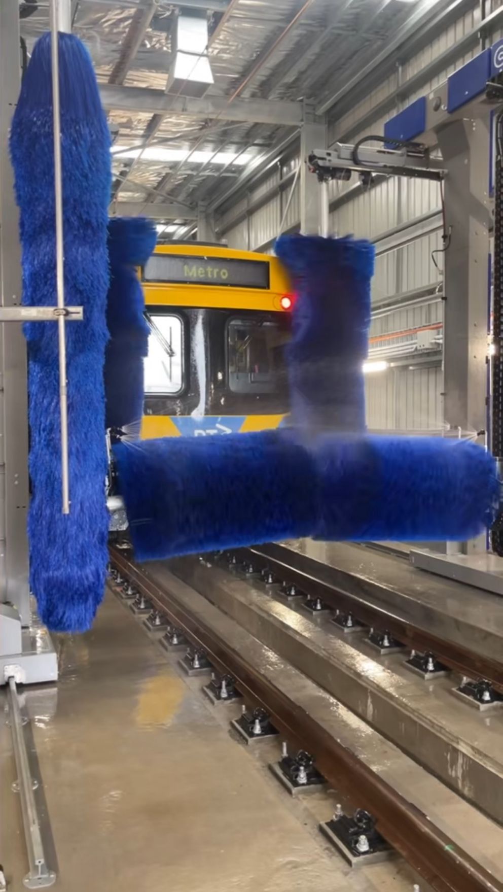 A train going through the train wash facility