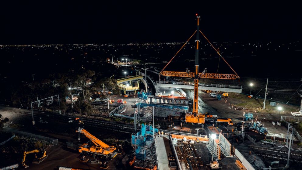 A 750-tonne crane on Calder Park Drive lifted 9 concrete beams into place