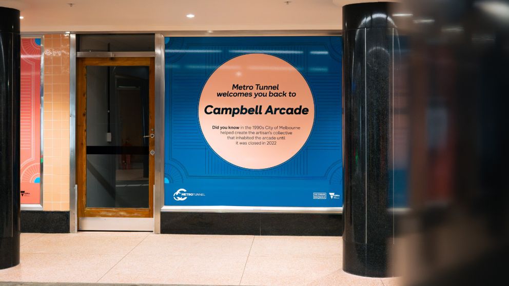 Metro Tunnel signage on a Campbell Arcade shop front. 