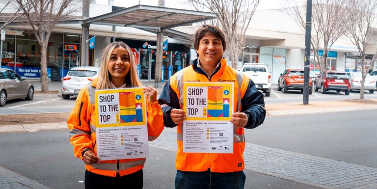 Epping Road project team members promoting shopping competition