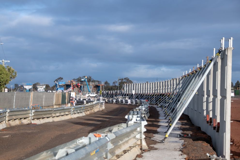 Sections of retaining wall being installed near Coburns Road
