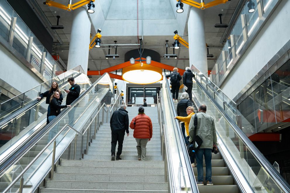 Future passengers use the escalators and stairs at Arden Station