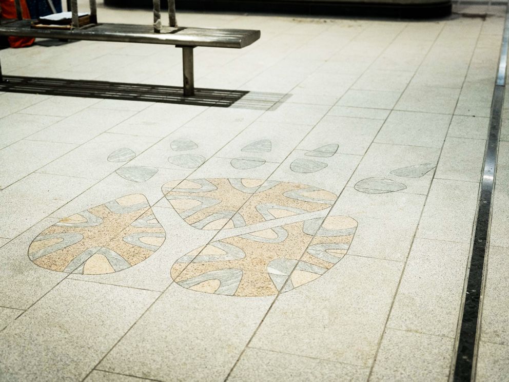 Granite footprints at platform level by Maree Clarke. 