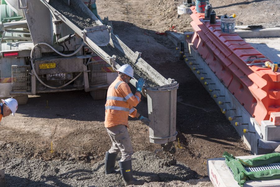 Pouring concrete for the new pedestrian ramps at West Tarneit Station