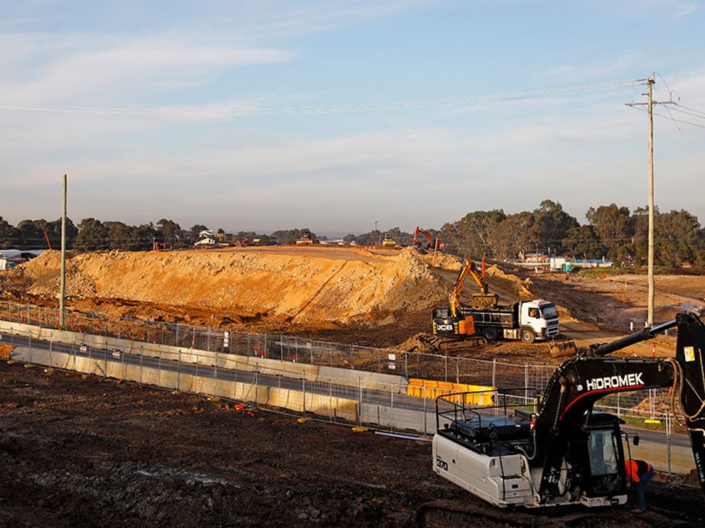 Bringing in material to build the bridge over Old Dandenong Road - June 2020