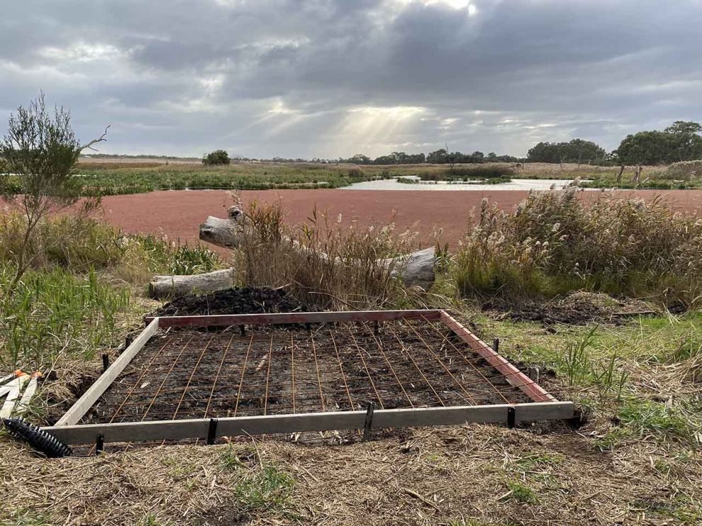 Laying the foundation for new bird hides the project has sponsored at the Braeside Park Wetlands 