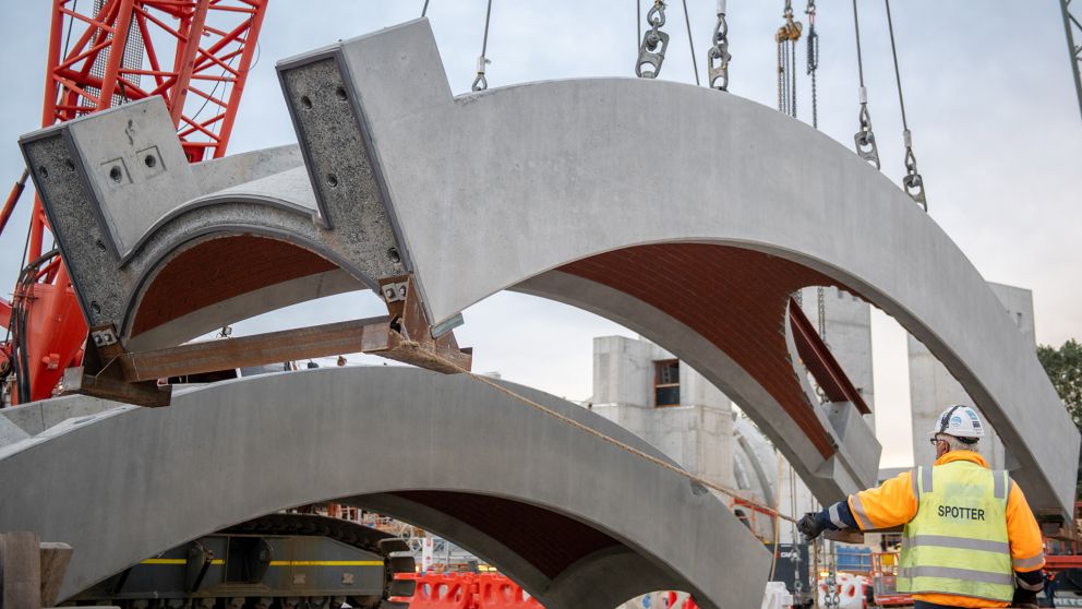 Concrete arches being lift onto the new Arden Station