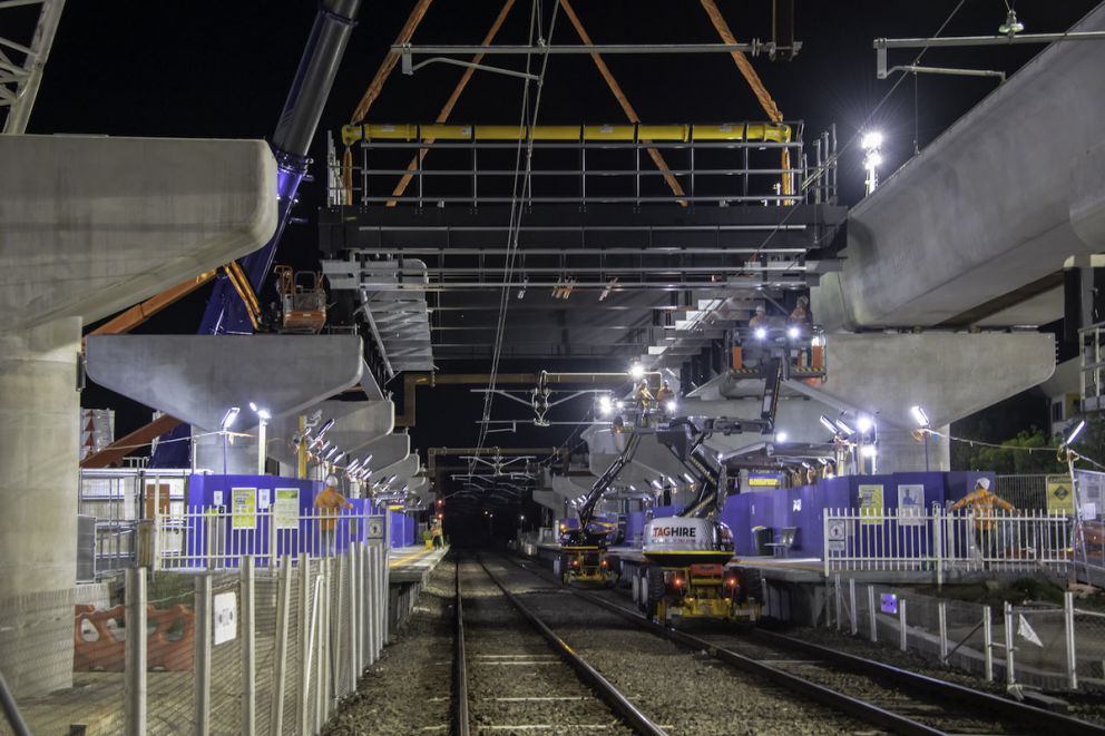 The steel platform structure is craned into place over Preston Station.