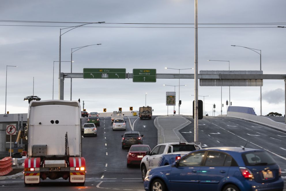 Cars travelling over the newly opened Old Geelong Road bridge.