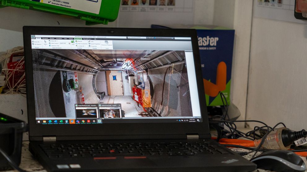 View of a laptop screen showing a train tunnel under construction