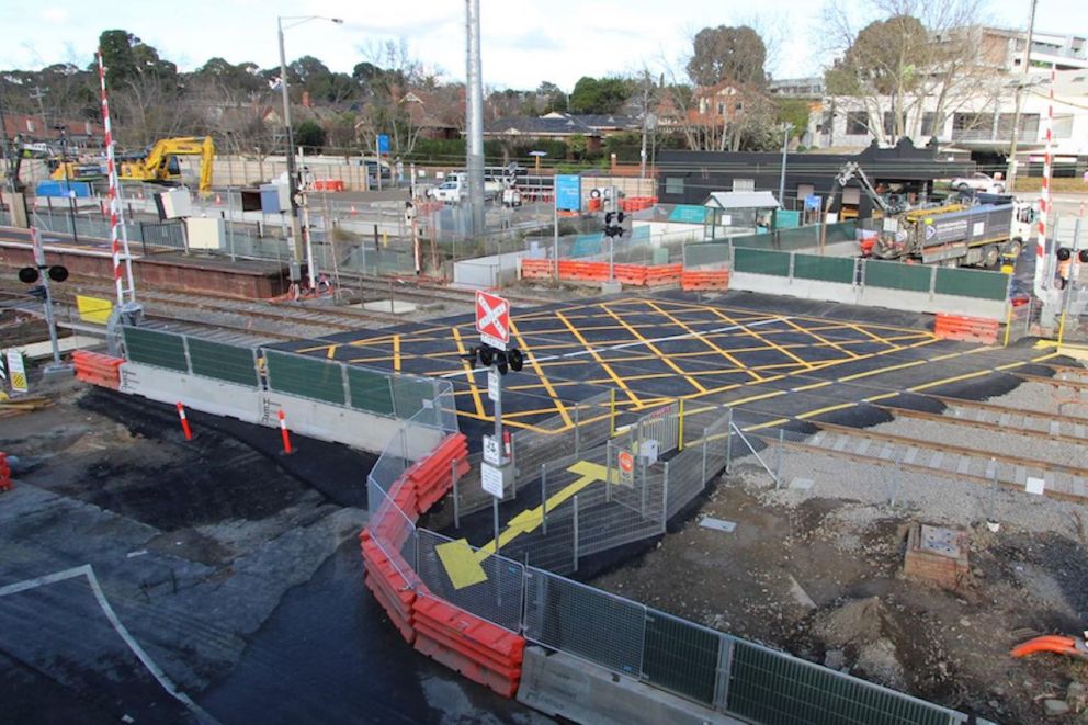 The newly asphalted Union Road level crossing