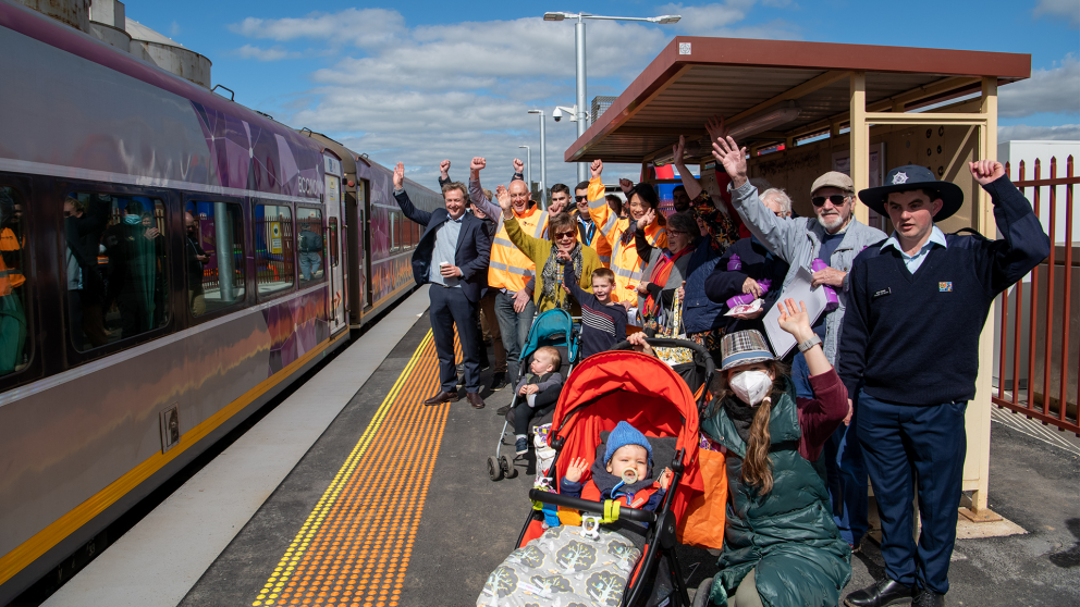 Shepparton community event crowd cheering train arriving arriving at platform