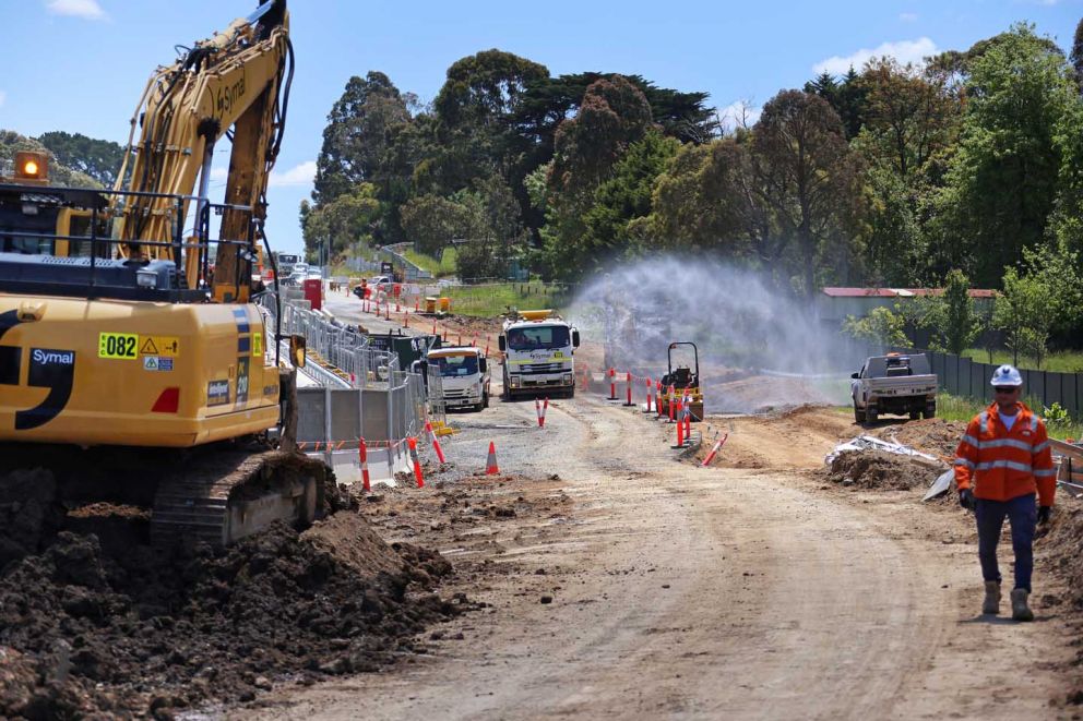 Wetting down the construction site along the southbound carriageway on Narre Warren North Road to minimise dust impacts for community