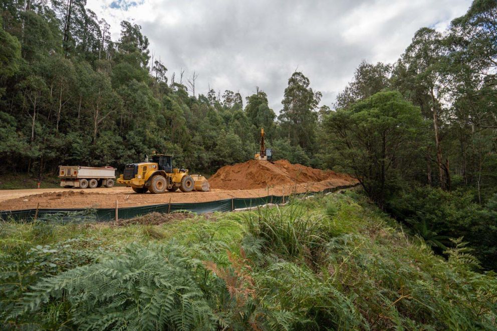 Articulated loader reading to load material at Fainter Falls carpark 31 March