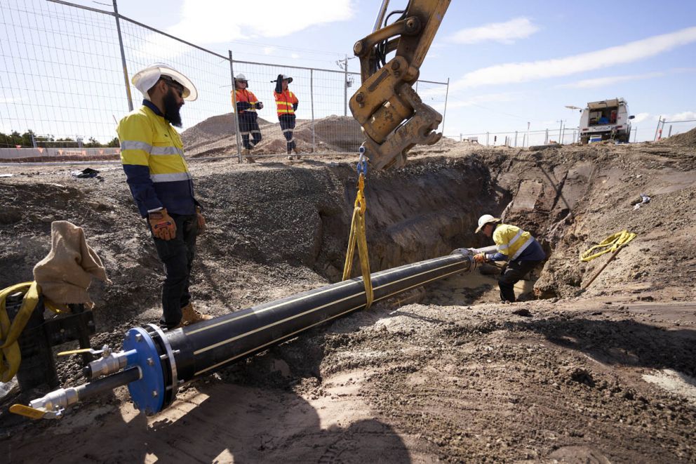 Future works - Two Gas technicians installing a gas pipe that’ll service the area once the Hall Road project is complete