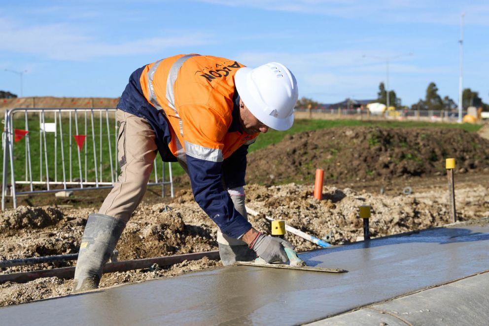 The finishing touch - An expert flawlessly levelling concrete to an ideal height