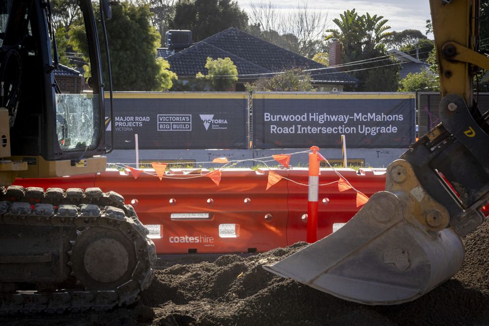 Work continues behind barriers on the Burwood Highway McMahons Road Intersection Upgrade.