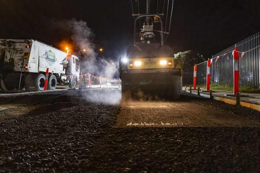 Laying asphalt on the service road south of Burwood Highway