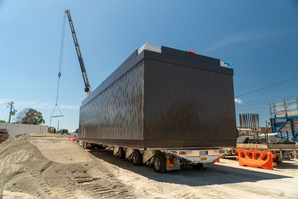 The first station building has arrived on site