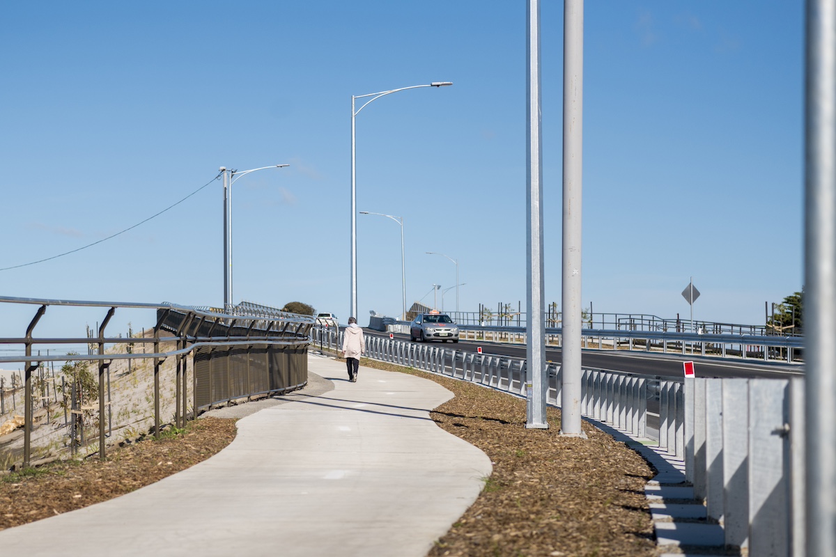 A pedestrian using the new shared use path