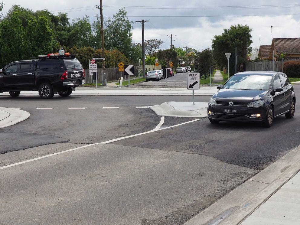 Car passing through roundabout