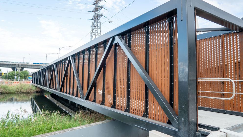 A close up look of the new walking and cycling bridge across Moonee Ponds Creek along Dynon Road.