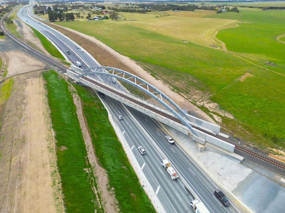 Two lanes of traffic flowing in each direction under the Kilmany Bridge