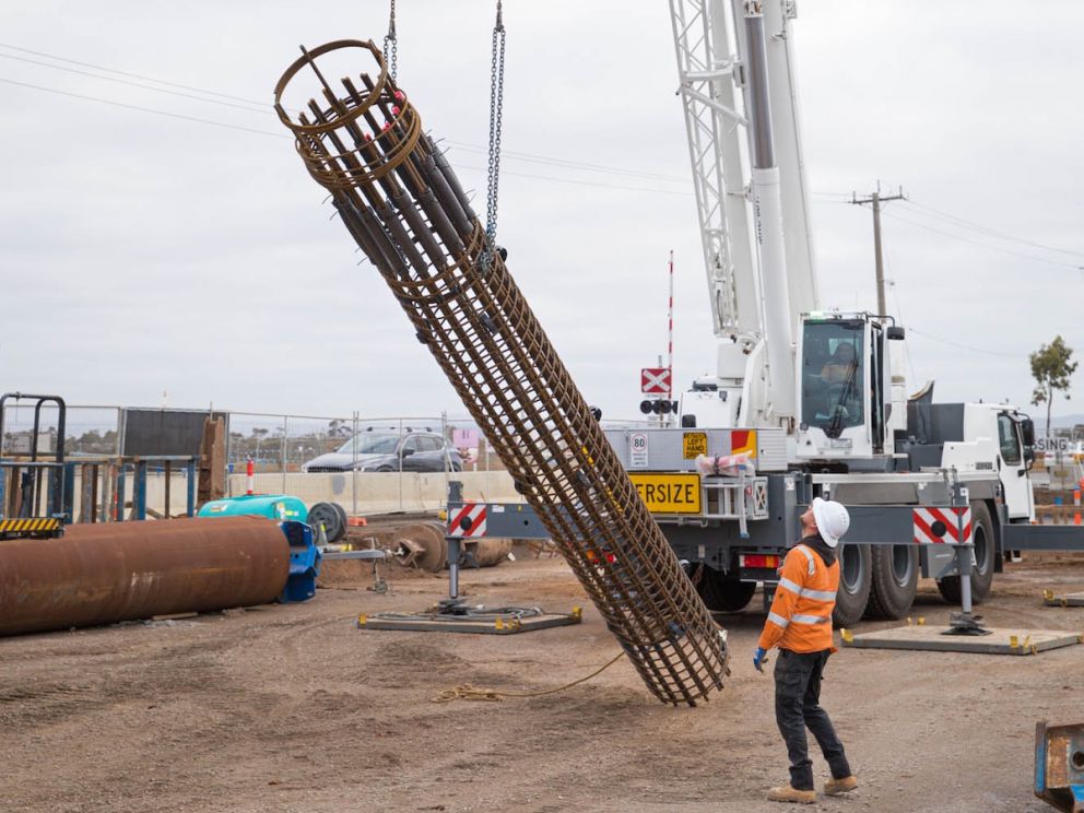 Pile cages are used to strengthen the foundations of the new road bridge