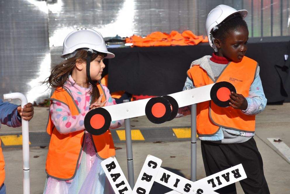 Future engineers – children explore railway safety with hands-on activities at a community event near the Coburns Road level crossing removal