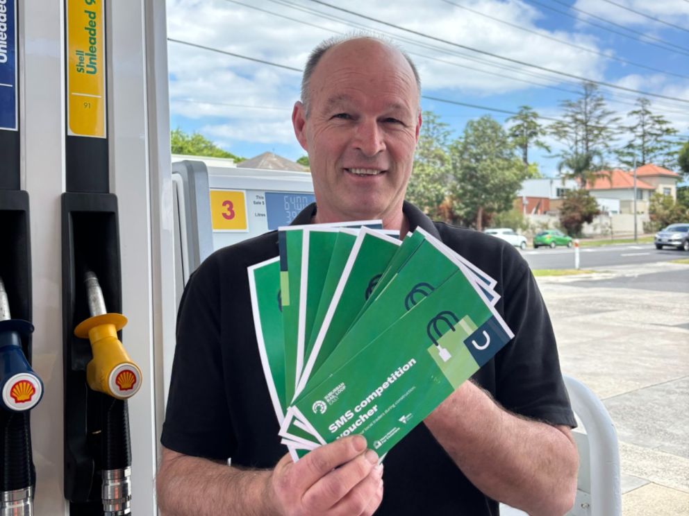 Business owner holding vouchers