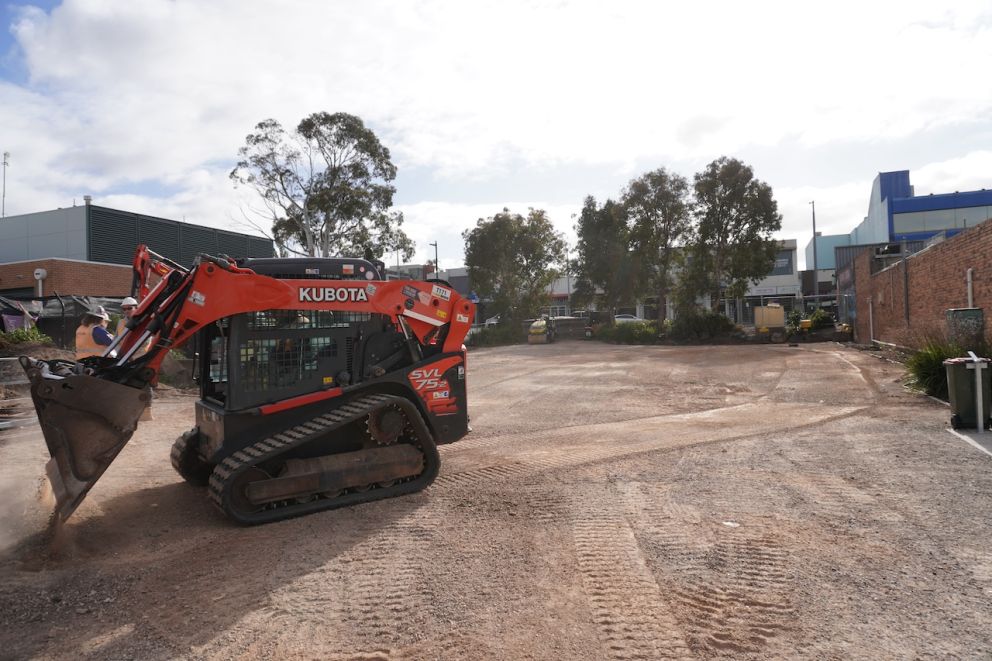 A track loader clears the ground for the Boronia Station Upgrade site office