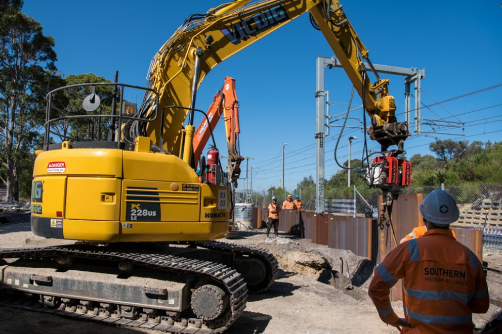Crews install sheet piles in preparation for the widening of the Klauer St bridge at Kananook. 