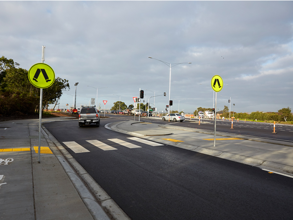 Image of Hallam Road highlighting a new pedestrian crossing with a car driving through it