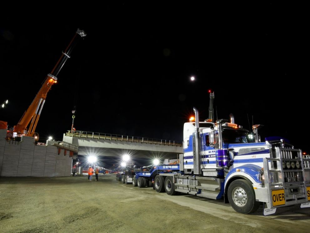 Lifting the beams into place for the bridge over Centre Dandenong Road.