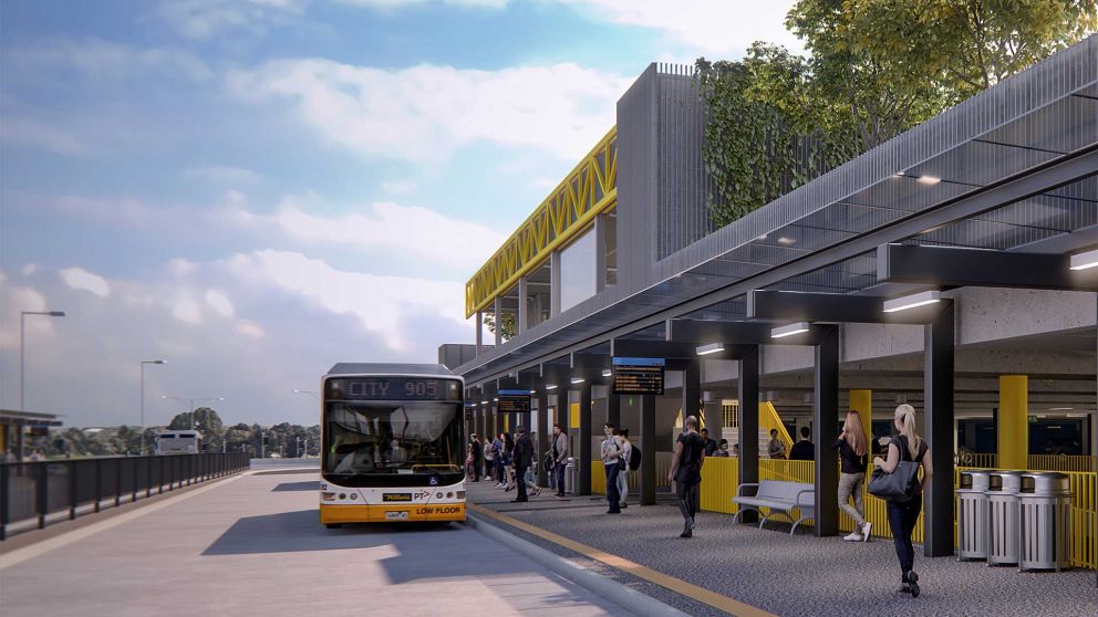  Artist impression of Bulleen Park and Ride northern ground platform looking west. A bus has pulled into the platform and passengers are waiting undercover or walking to board the bus.