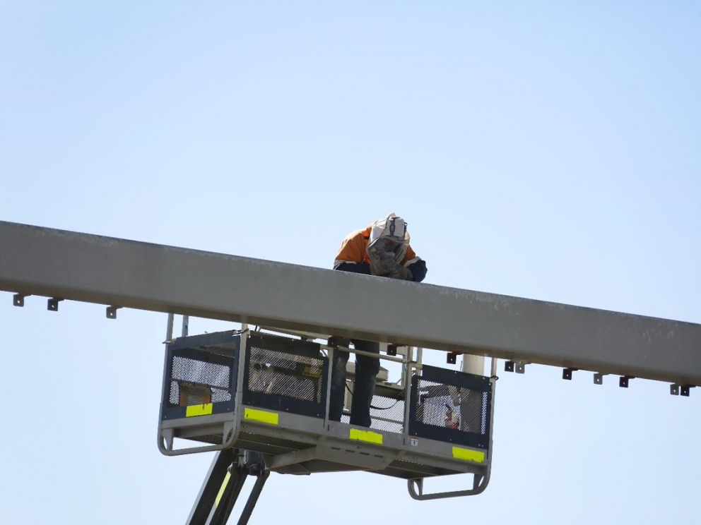 Installing signage structures on the Hume Freeway