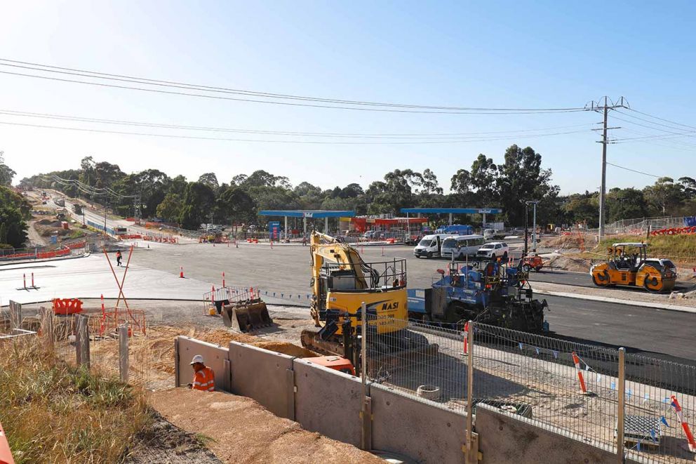 Laying asphalt onto road