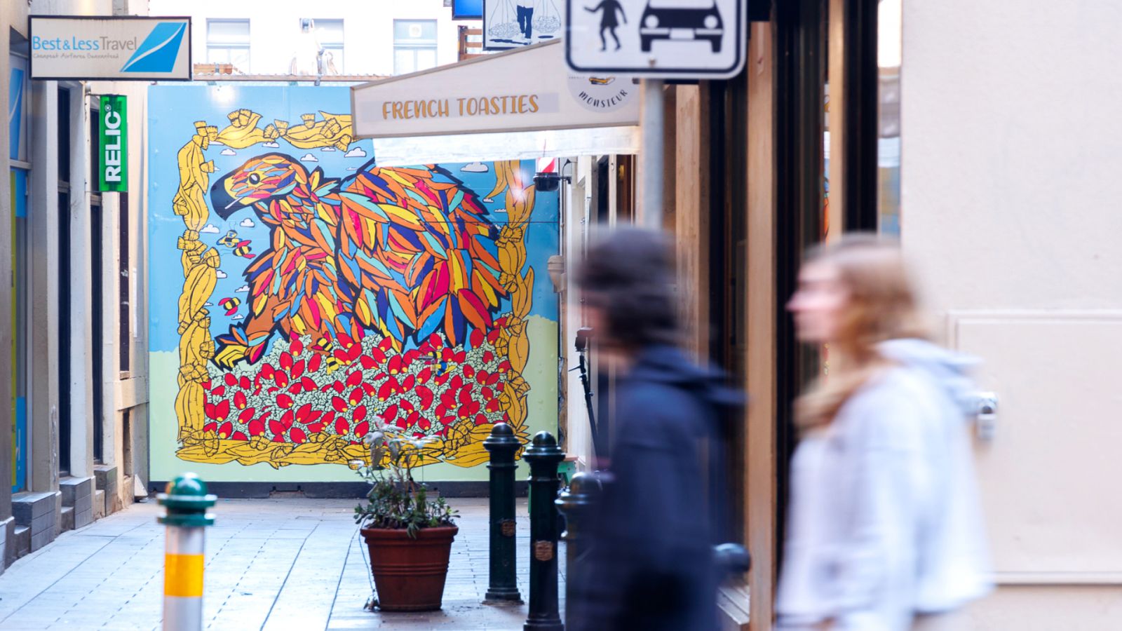 Image of Vandal's colourful artwork installed at the end of Scott Alley