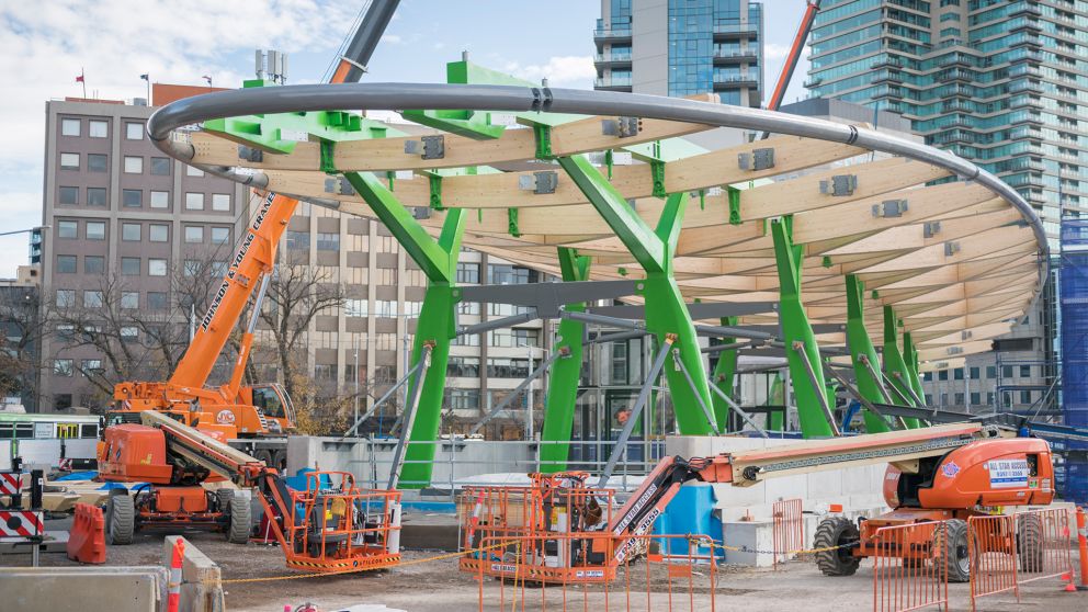 View of the full canopy with installed green legs and crossbeams.