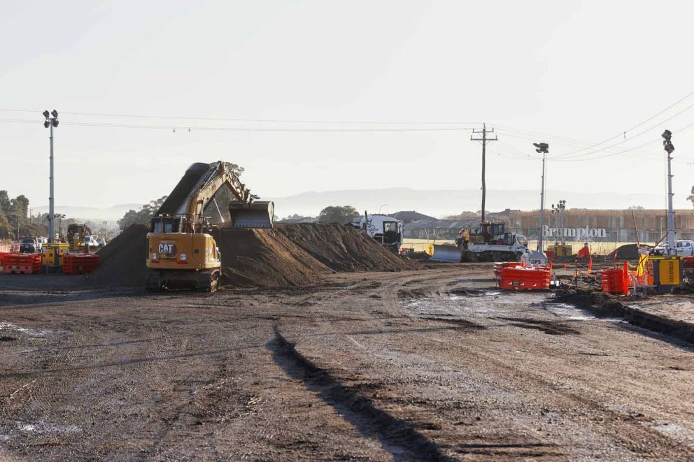 Stockpiling material to build the expanded intersections