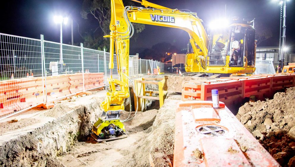 Power relocation works underway near Craigieburn Police Station. With the power laid into the trench, crews work to compact the backfill. 