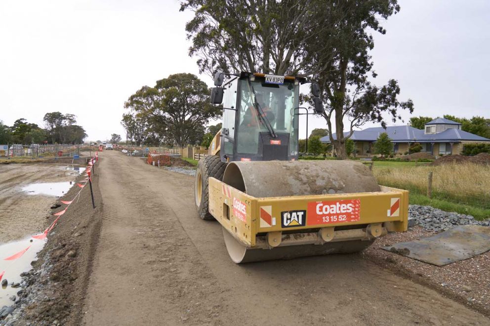 13 tonne roller compacting material for the foundation of the new lanes