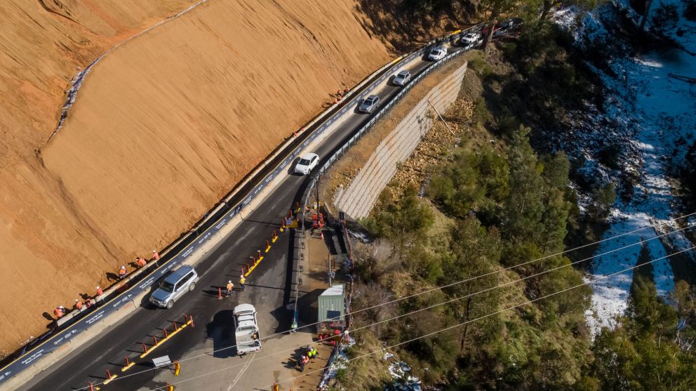 Aerial view of vehicles passing the landslip heading to Falls Creek