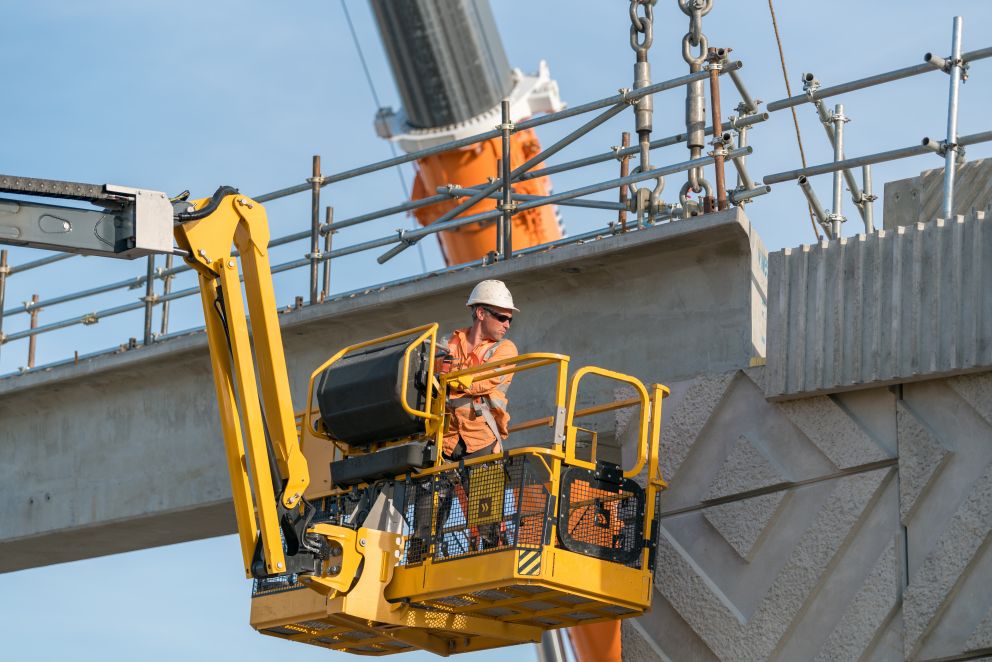 Our team connecting the beams to the road bridge