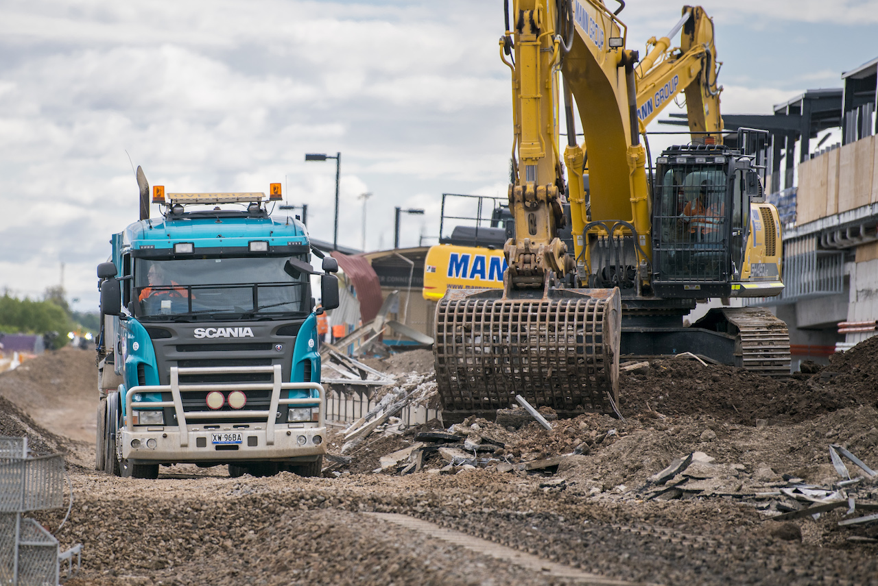 Loading the materials from the demolished Deer Park Station into a truck for recycling