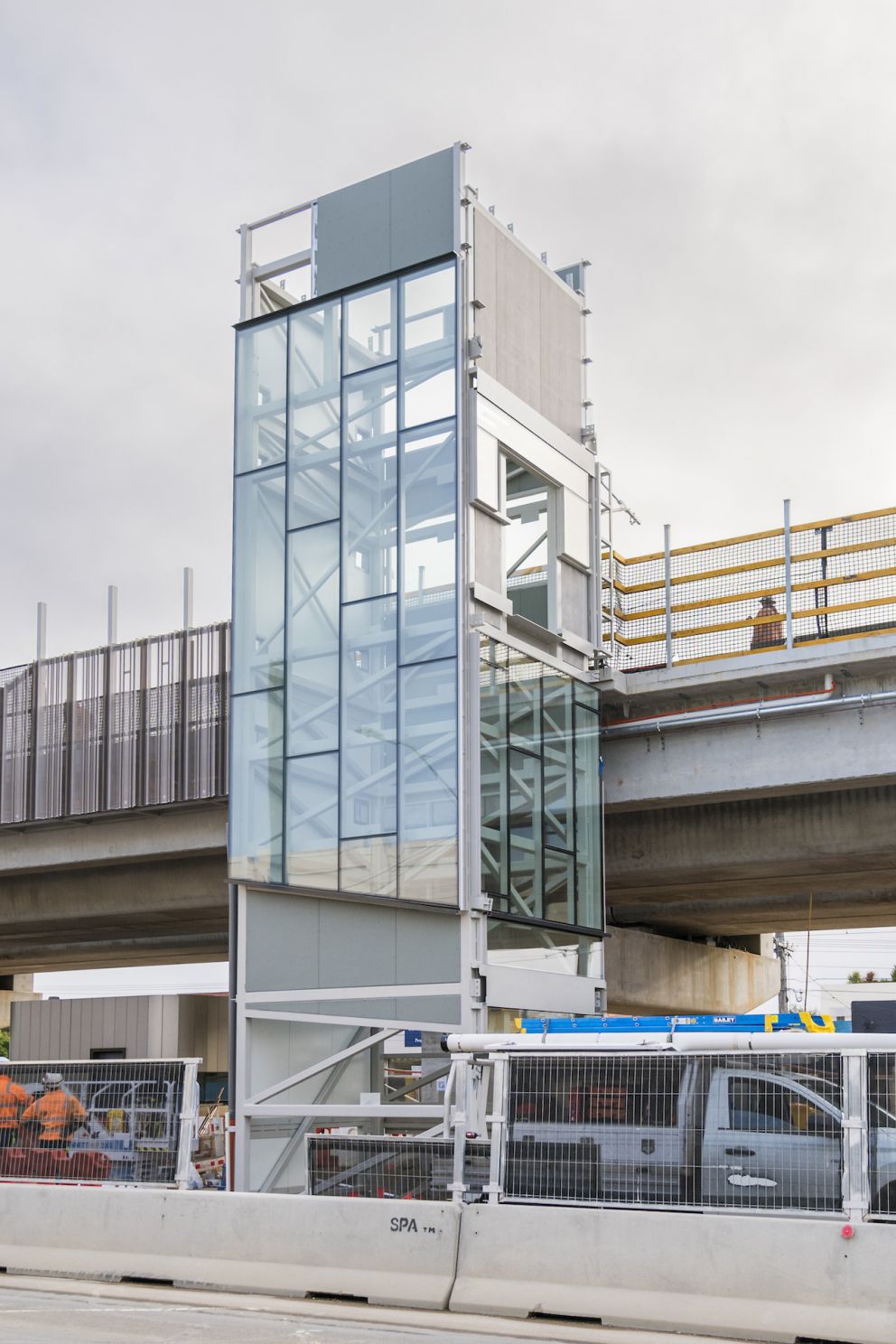 A lift shaft being installed for commuters to access the elevated platforms